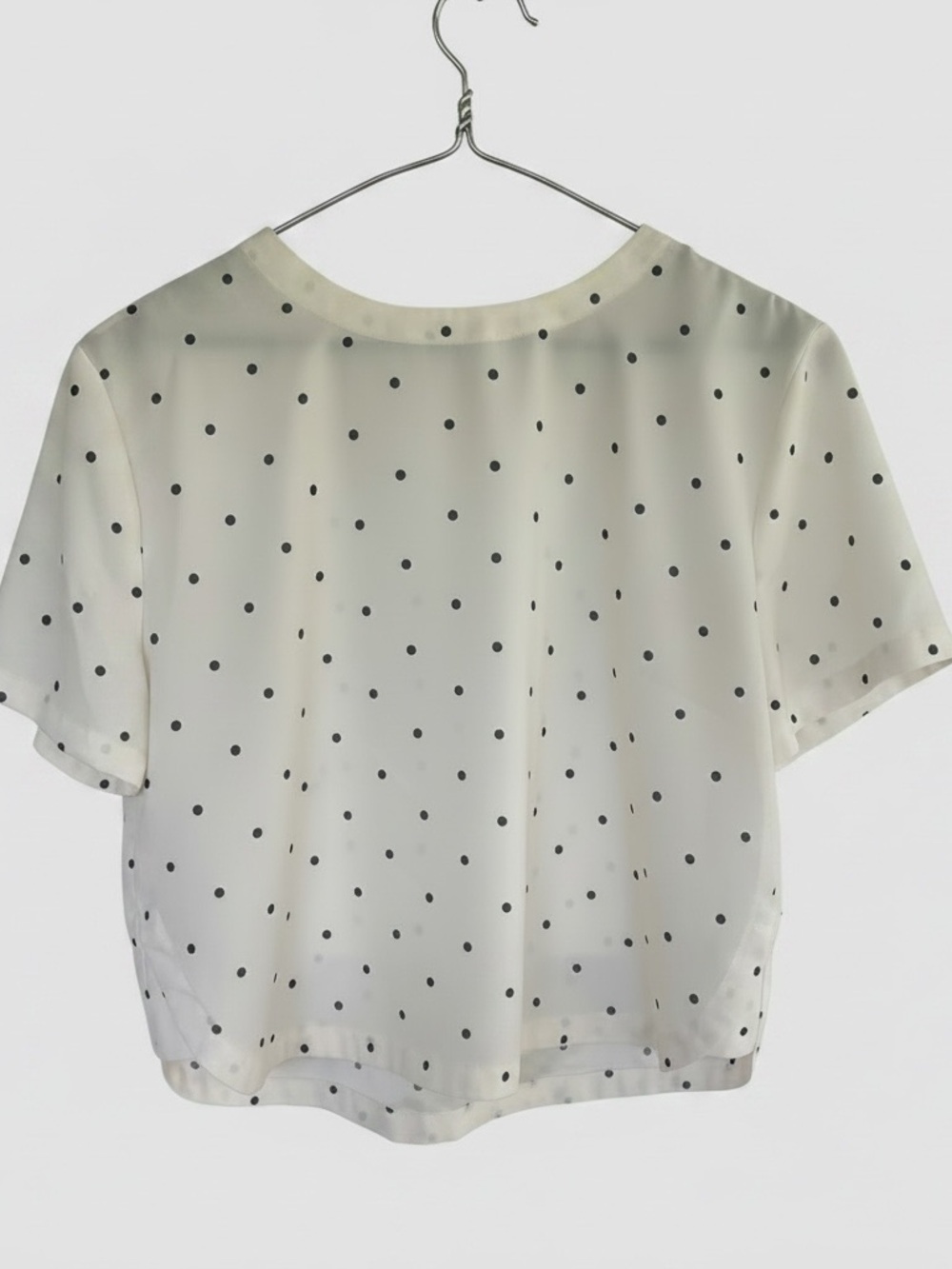 Modern Tee with Whisper White as the base color and black/navy polka dots.